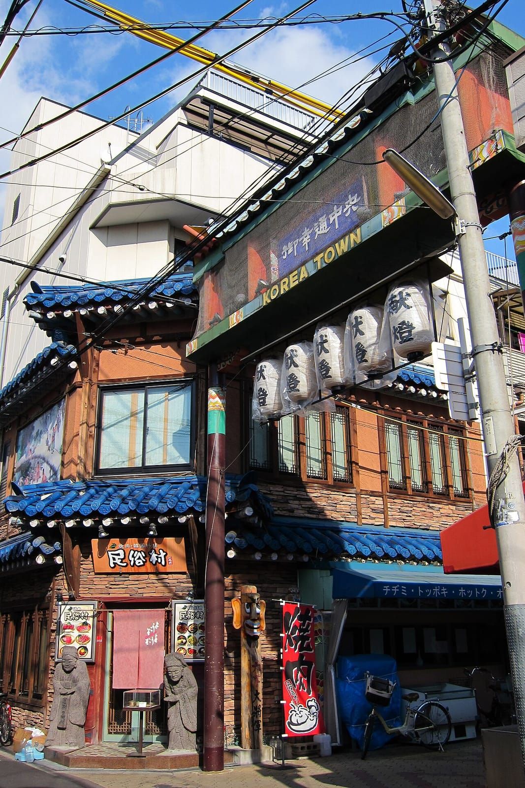 The Miyukidori 'GREAT TOWN' gateway with Korean-style tiled roofs at Osaka's Ikuno Korea Town